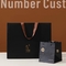 Het Stempelen van Matte Black Paper Bag Gold van het Grosgrainhandvat Hete Kleinhandelsdocument het Winkelen Zak
